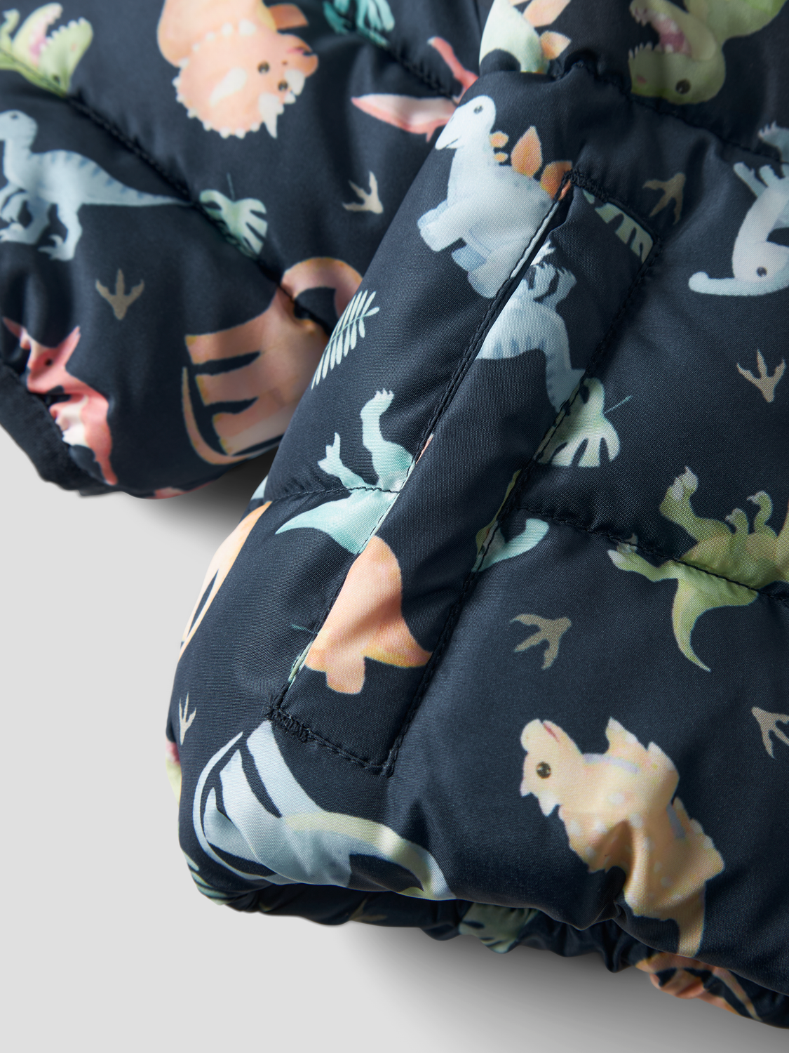 13243881 PIUMINO NEONATO DINOSAURI NAME IT